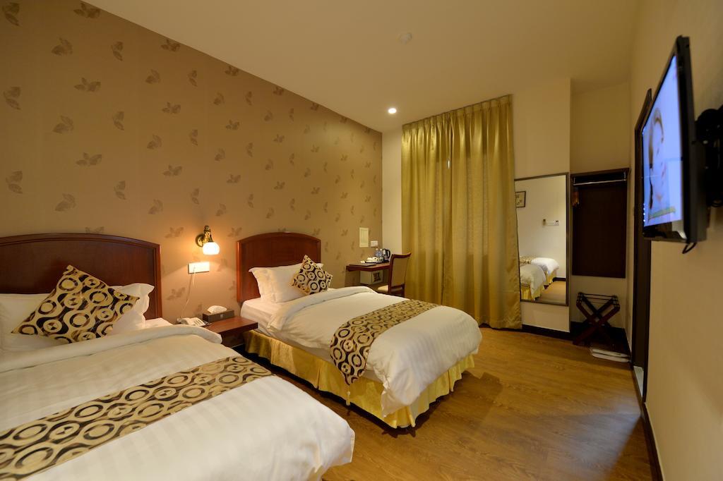 Asiana Hotel Kota Kinabalu Rom bilde